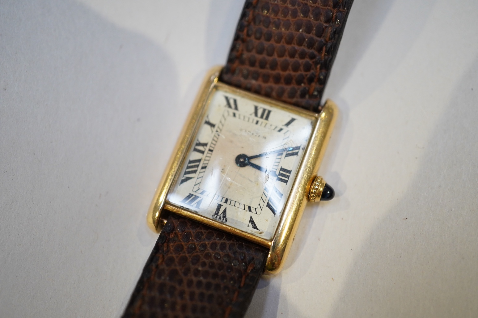 Richard Avedon (American, 1923-2004), a Cartier 18ct. gold tank manual wind wrist watch